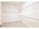 Bright walk-in closet with shelving at 2604 Meadowedge Loop, St Cloud, FL 34772