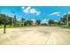 Outdoor basketball court surrounded by green space, providing a great place for recreation and exercise at 2605 Daulby St, Kissimmee, FL 34747