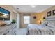 Bedroom with neutral walls, carpet floors, and a view of the window at 2605 Daulby St, Kissimmee, FL 34747