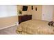 Bedroom with neutral walls, carpet floors, and a view of a window at 2605 Daulby St, Kissimmee, FL 34747