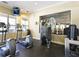 A well-equipped fitness center featuring treadmills, ellipticals, and weight machines at 2605 Daulby St, Kissimmee, FL 34747