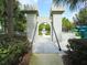 Unique castle-themed playground entrance with stone turrets and a chain-link drawbridge at 2605 Daulby St, Kissimmee, FL 34747