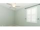 Bedroom features plantation shutters, carpet, and ceiling fan at 2752 Bellewater Pl, Oviedo, FL 32765
