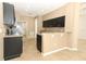 Spacious kitchen featuring granite countertops, tile flooring, and stainless steel appliances at 2752 Bellewater Pl, Oviedo, FL 32765