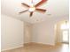 Open living room featuring neutral walls, decorative ceiling fan and tile flooring at 2752 Bellewater Pl, Oviedo, FL 32765