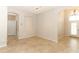 Spacious living area with tile floors, an arched entryway, and lots of natural light at 2752 Bellewater Pl, Oviedo, FL 32765