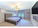 Bedroom with grey walls, carpet, and a large window at 2783 Red Horse Dr, Kissimmee, FL 34744