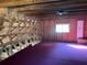Upper level with wooden beams and flooring; could be used for storage or a playroom at 3064 S Us Highway 41, Dunnellon, FL 34432