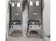 Two grey Lennox furnaces with black piping sit on stands on the floor of a room at 3294 Hanging Tide St, Winter Garden, FL 34787