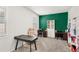 Spacious home office featuring multiple desks, a comfortable chair, and ample storage at 3294 Hanging Tide St, Winter Garden, FL 34787