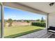 Covered patio featuring brick flooring and an expansive backyard with a lush green lawn at 3294 Hanging Tide St, Winter Garden, FL 34787