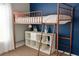 Loft bed with copper-colored frame, storage shelves, and blue accent wall, ideal for a room at 358 Fairfield Dr, Sanford, FL 32771