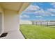 This home features a covered patio and a backyard overlooking a pond at 3945 Angola Ln, Sanford, FL 32771