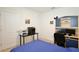 Bright bedroom with a desk and computer setup, perfect for work or study at 3945 Angola Ln, Sanford, FL 32771