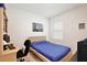 Cozy bedroom features a comfortable bed, a desk for studying, and a bright window at 3945 Angola Ln, Sanford, FL 32771