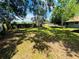 Expansive backyard, partially shaded by mature trees and fully fenced at 412 Editha Cir, Sanford, FL 32771