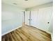 Bedroom with hardwood floors and a spacious closet at 412 Editha Cir, Sanford, FL 32771
