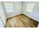 Bedroom featuring hardwood floors and ample natural light at 412 Editha Cir, Sanford, FL 32771