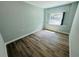 Empty bedroom with neutral paint, vinyl flooring and a window at 412 Editha Cir, Sanford, FL 32771