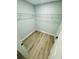 A walk-in closet provides wire shelving and wood-look floors at 412 Editha Cir, Sanford, FL 32771