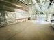 Spacious garage features insulation, shelving, workbench and plenty of room for storage at 412 Editha Cir, Sanford, FL 32771