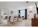 Comfortable living room with modern furniture, bright decor, and view to front door at 417 Carvell Dr, Winter Park, FL 32792