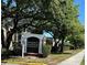 Regency Gardens Condominiums entrance sign and lush landscaping add to the property's appeal at 4225 Thornbriar Ln # 305, Orlando, FL 32822