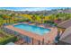 A manicured community offers a swimming pool, playground, pavilion, and other amenities at 4432 Seven Canyons Dr, Kissimmee, FL 34746