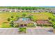 Aerial view of the community amenities featuring a pool, clubhouse, playground, and pavilion at 4432 Seven Canyons Dr, Kissimmee, FL 34746