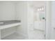 Bright and clean bathroom showcasing a sleek vanity and sink, plus a built-in makeup station at 4432 Seven Canyons Dr, Kissimmee, FL 34746