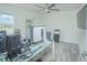 Bright bedroom with a desk setup, modern ceiling fan, and plenty of open space at 4432 Seven Canyons Dr, Kissimmee, FL 34746