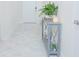 Bright foyer featuring tile floors, console table and a clear view of the entrance door at 4432 Seven Canyons Dr, Kissimmee, FL 34746