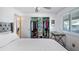 Well-lit bedroom featuring a spacious closet and an organized workspace by the window at 4465 Ring Neck Rd # C, Orlando, FL 32808