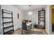 Modern dining room with sleek table and chairs, complemented by stylish shelving and decor at 4465 Ring Neck Rd # C, Orlando, FL 32808