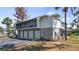 Exterior corner unit condo with three-car garage, patio, and green space at 4465 Ring Neck Rd # C, Orlando, FL 32808