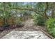 Backyard featuring a patio area and a wooden fence at 448 Sundown Trl, Casselberry, FL 32707