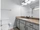 Updated bathroom with granite countertop, modern fixtures, and plenty of vanity storage at 448 Sundown Trl, Casselberry, FL 32707