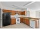 Efficient kitchen design features cabinets and appliances for cooking convenience at 504 Delido Way, Kissimmee, FL 34758