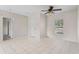 Bright and airy living room with neutral walls and tile flooring at 504 Delido Way, Kissimmee, FL 34758