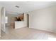 Spacious living room with tiled floors, neutral walls, and plenty of natural light at 504 Delido Way, Kissimmee, FL 34758