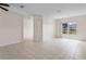 Spacious living room with neutral walls and tile flooring at 504 Delido Way, Kissimmee, FL 34758