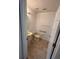 Half bathroom with a pedestal sink, a tiled floor and accessible grab bars at 508 Royal Tree Ln, Oviedo, FL 32765