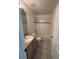 Functional bathroom featuring a shower-tub combo, vanity with sink, and tile flooring for easy maintenance at 508 Royal Tree Ln, Oviedo, FL 32765