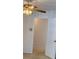 Bedroom features carpet flooring, ceiling fan and a white door with neutral paint at 508 Royal Tree Ln, Oviedo, FL 32765