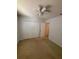 Bedroom featuring neutral carpet, a ceiling fan, and a closet at 508 Royal Tree Ln, Oviedo, FL 32765
