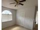 Bedroom featuring neutral carpet, a ceiling fan, and a window at 508 Royal Tree Ln, Oviedo, FL 32765