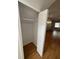 Walk-in closet features clothing rod and neutral paint and flooring throughout at 508 Royal Tree Ln, Oviedo, FL 32765