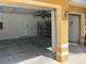 Spacious two car garage with high ceilings, storage, and side pedestrian access at 508 Royal Tree Ln, Oviedo, FL 32765