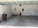 Clean two car garage with high ceilings and pedestrian door at 508 Royal Tree Ln, Oviedo, FL 32765