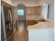 Bright kitchen featuring stainless steel appliances and ample counter space at 508 Royal Tree Ln, Oviedo, FL 32765